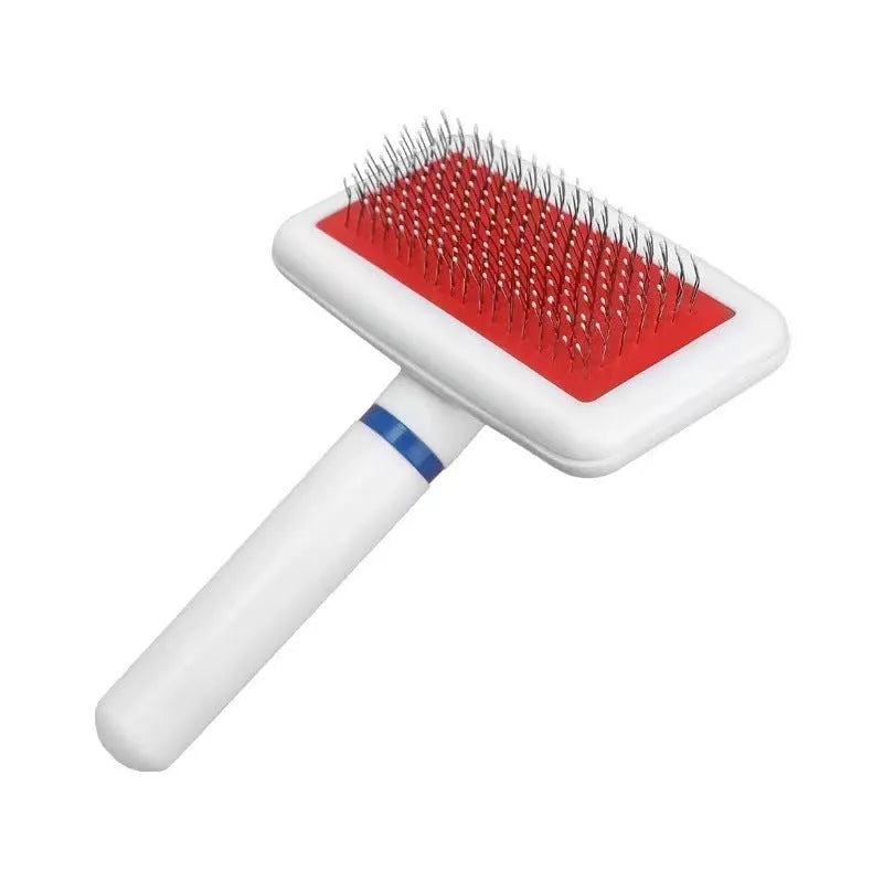 Pet hair removal comb with stainless steel teeth and light blue ABS handle on white background