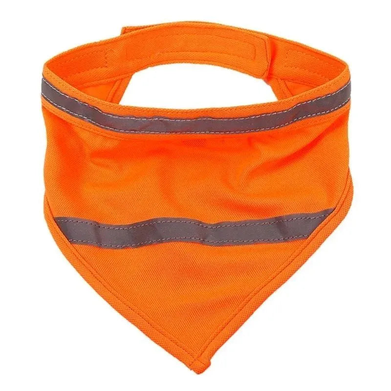 Yellow and orange reflective triangular dog bandana with adhesive strap on a dog's neck.