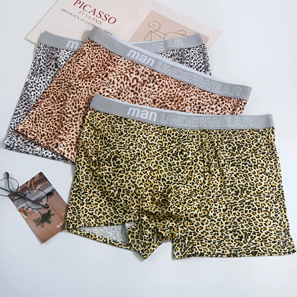 Men's loose leopard print underwear in milk silk polyester fabric showing mid waist design