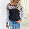 Women's black leopard print patchwork pullover sweater, loose fit, round neck, long sleeves, polyester knit
