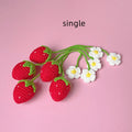 Wool crochet woven strawberry pendant necklace showing knitted texture and single charm design