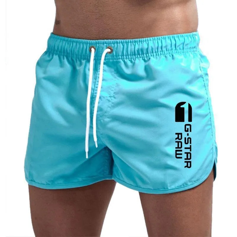 Men's thin hemp-blended polyester sports shorts in multiple colours on a size chart background.