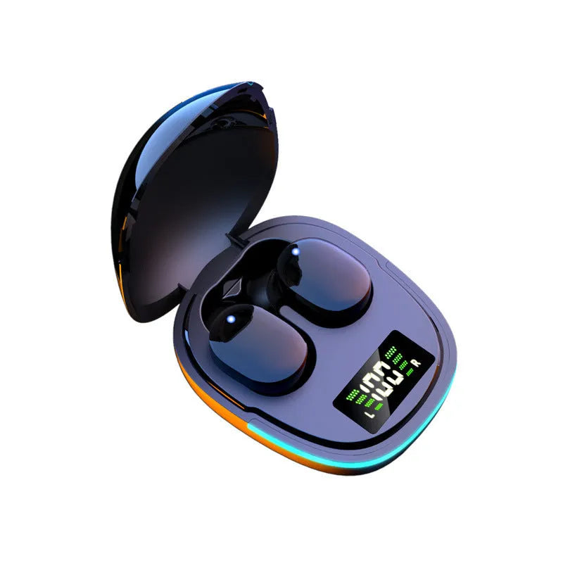 Black wireless Bluetooth in-ear headphones and magnetic charging case on a table.