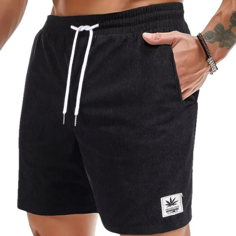 Man's drawstring waist summer shorts in blue, showing straight leg and casual fit