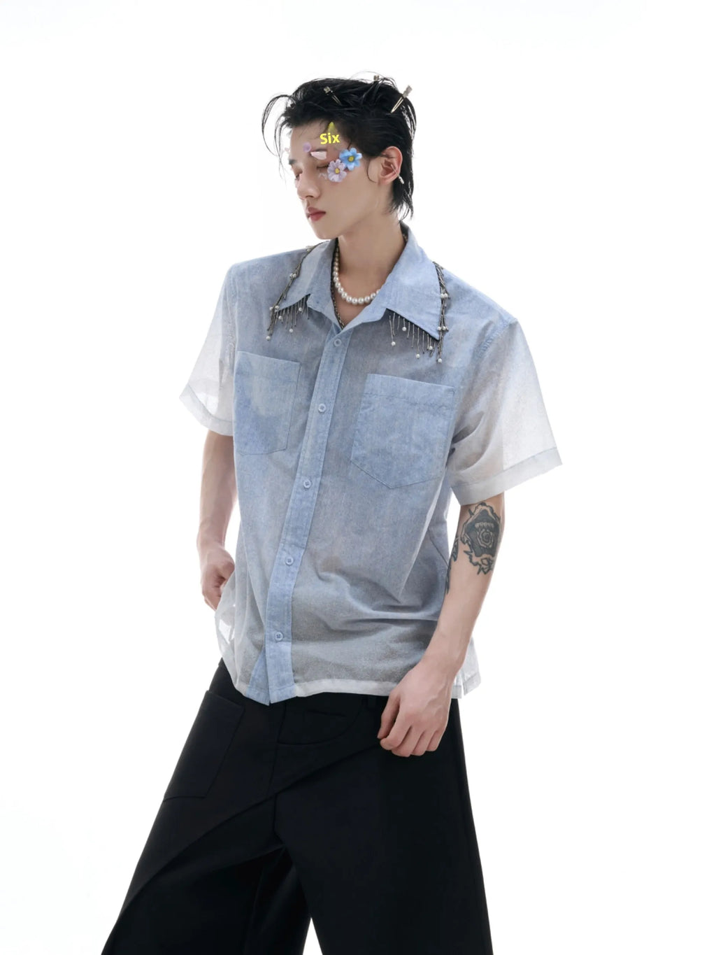 Blue and white gradient loose fit short sleeve shirt on a hanger