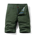 Men's khaki cotton casual overalls with straight legs and a zipper fly front.