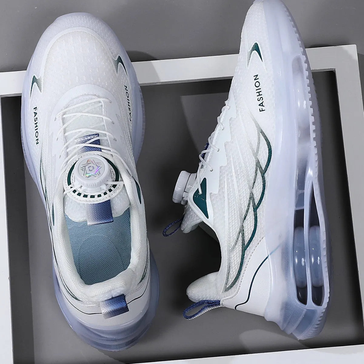 White men's low-top casual sports shoes with a rotating button lace system and breathable mesh upper.