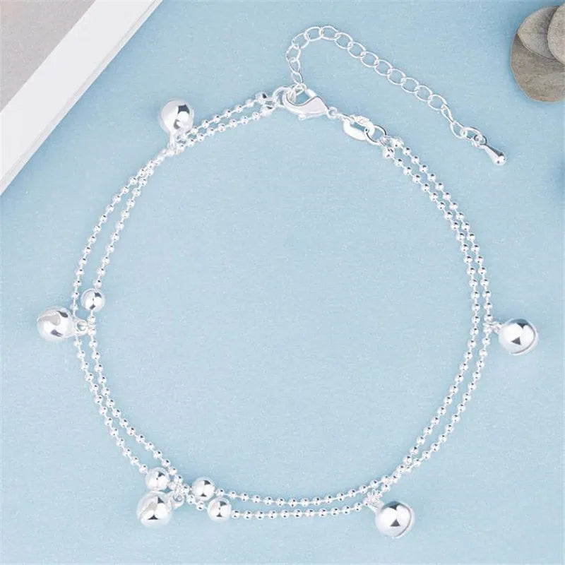Silver plated bell anklet with geometric design, 16cm chain plus 3cm extension, copper base