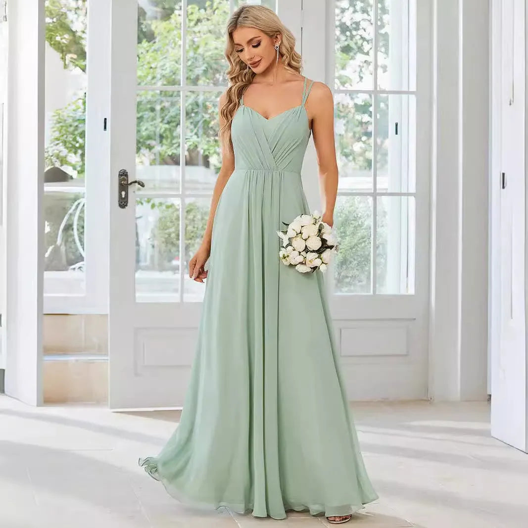 Women's sleeveless A-line long dress with pleated skirt detail in solid colour