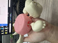 ABS turtle design drink coaster in light green on a table