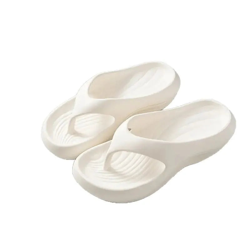 Women's thick-soled EVA flip-flops in black, white, or grey colours with non-slip and anti-odour properties