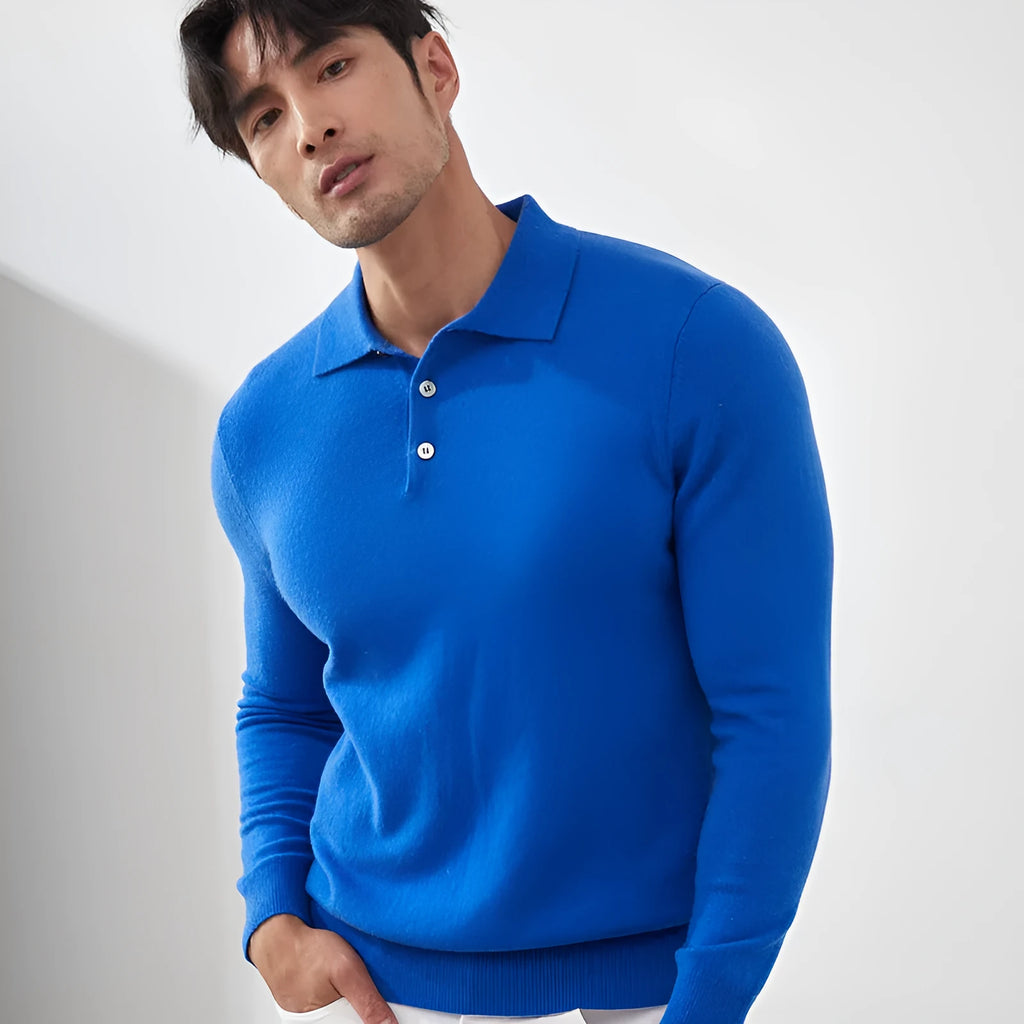 A sapphire blue men's cashmere pullover sweater with a polo collar, shown in a loose fit.