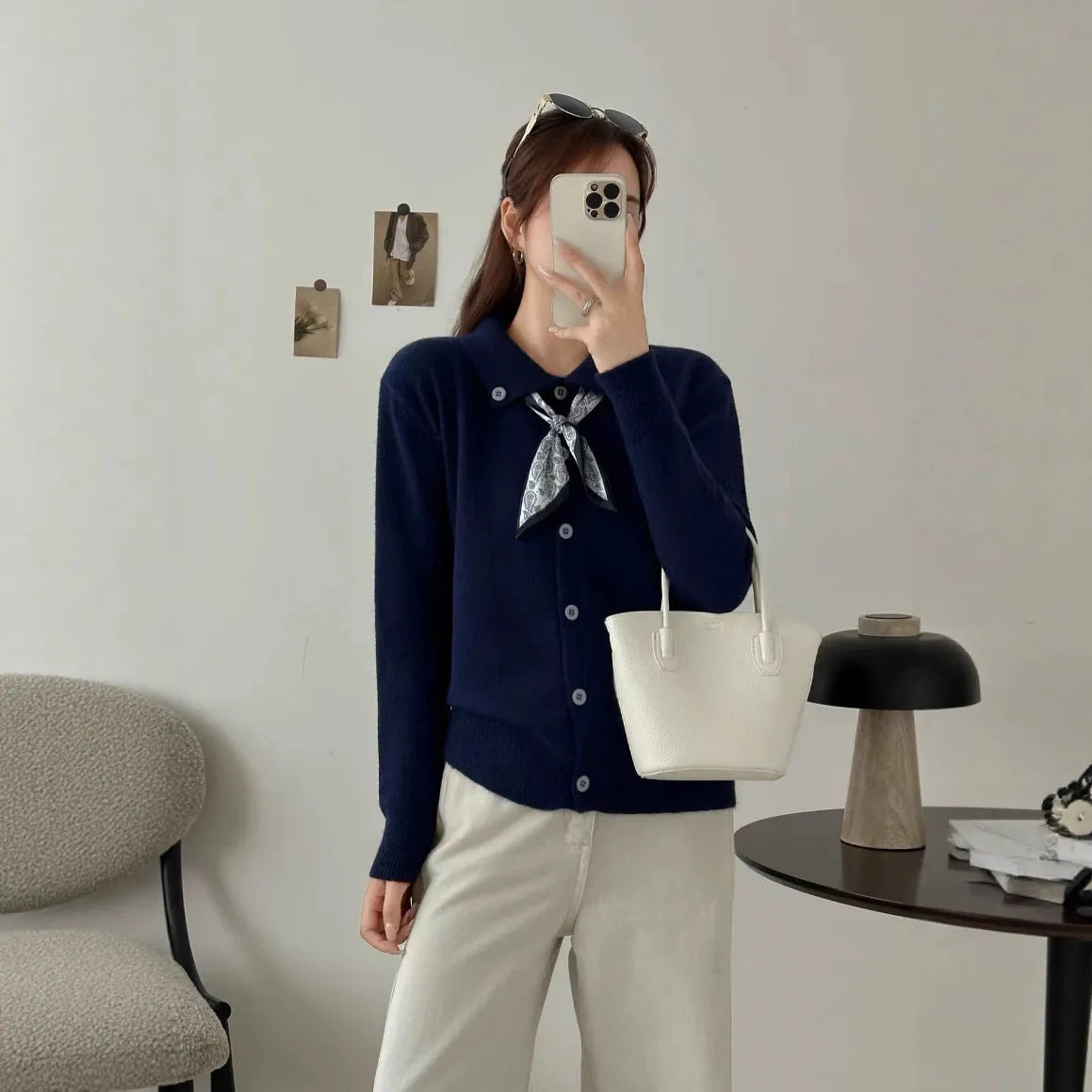 Beige lapel scarf style acrylic cardigan sweater with long sleeves and splicing detail.