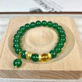 Handmade green chalcedony and red agate beaded bracelet with copper geometric design