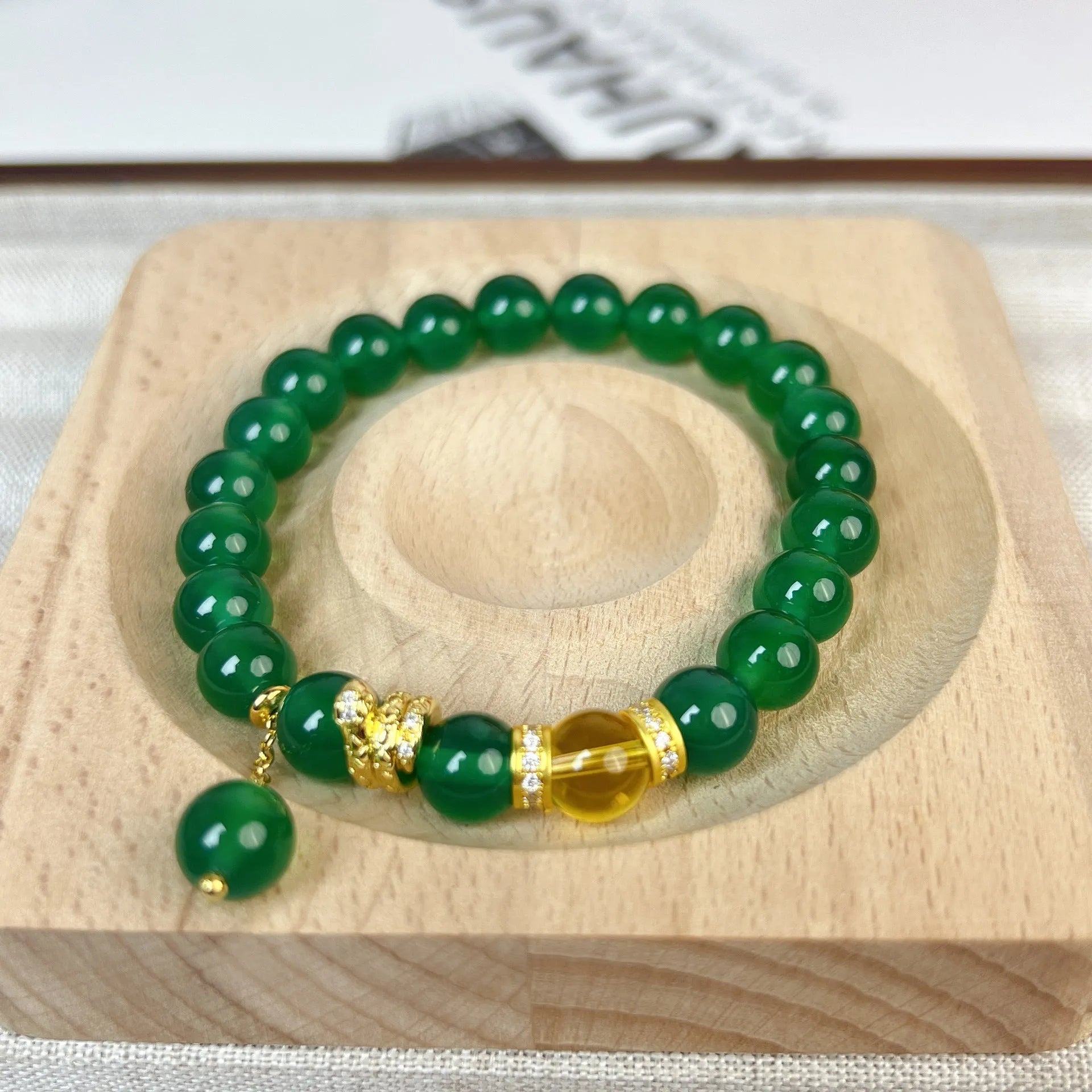 Handmade green chalcedony and red agate beaded bracelet with copper geometric design