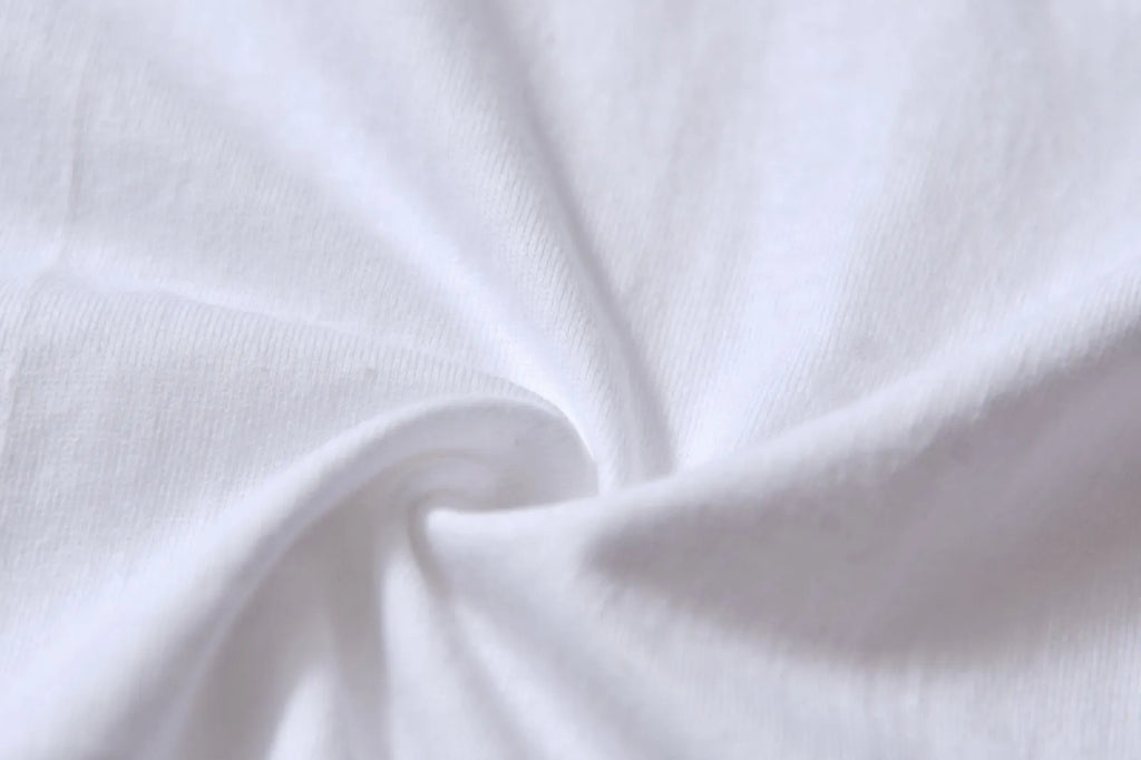 White cotton pattern overalls with short sleeves and loose pullover style