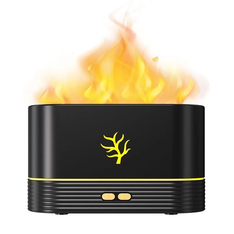 Black square USB aroma diffuser with LED flame light effect and mist output on a wooden table.