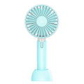 Blue USB-powered mini desk fan with three-speed settings and oscillating head on desktop