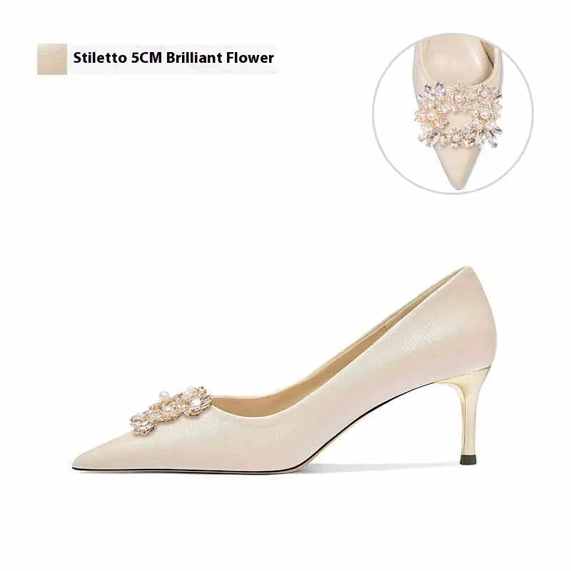 Women's crystal bridal high heels with rhinestone detail, pointed toe, and choice of stiletto or cat heel in 5cm or 8cm heights.
