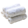 White microfiber washable diaper absorbent pad 33x13cm on plain background