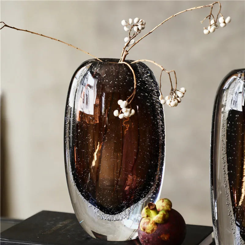 Amber glaze bubble glass vase with flat mouth and thick bottom on table