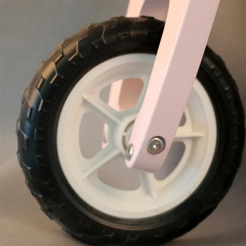 Pink wooden balance scooter for toddlers and children aged 1-6 years