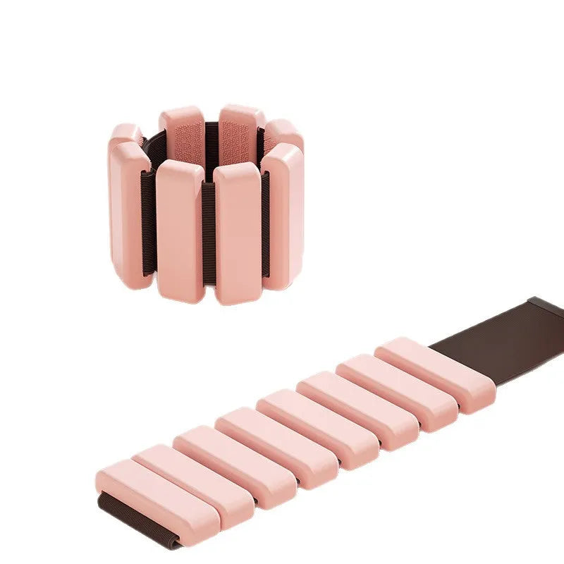 Detachable 1 lb sports weight-bearing bracelet in black, grey, light pink or pink for wrist and ankle use