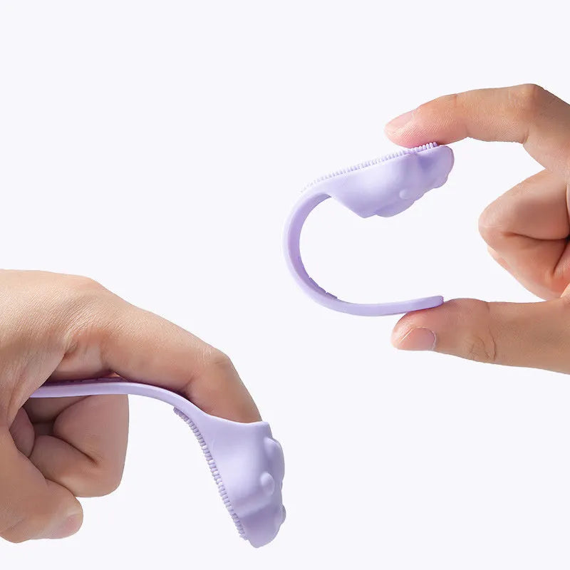 Silicone finger toothbrush for pets in pink, purple and yellow colours