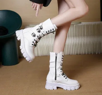 Women's black mid-calf knight boots with a metal buckle and side zip fastening
