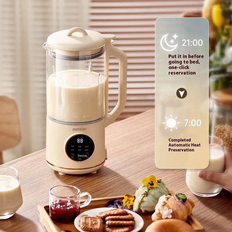Automatic soya milk maker with glass jug in milky white colour on a kitchen countertop.