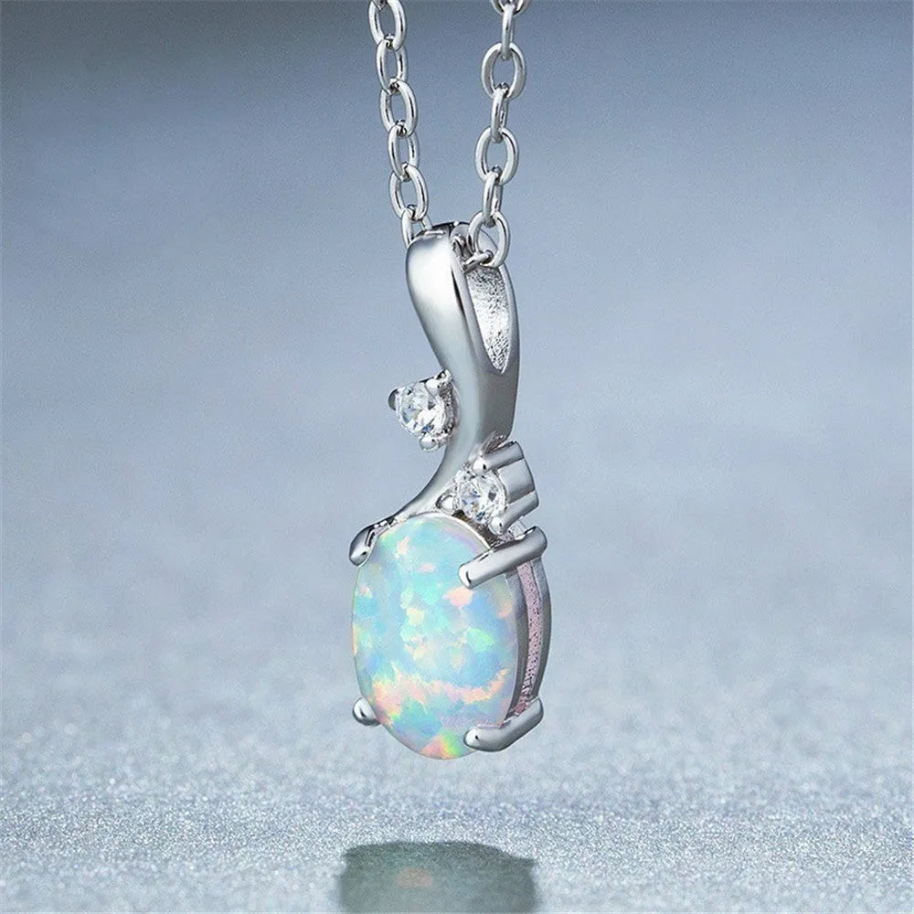 Water drop shaped opal pendant necklace on O-shaped chain in rose gold or white finish