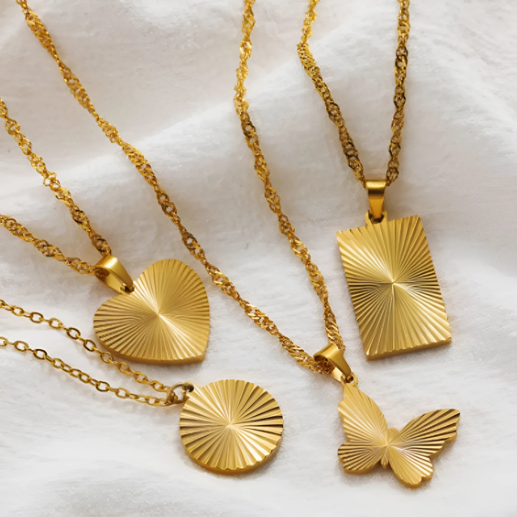 Stainless steel necklace with 18K gold electroplated finish and multiple pendant shape options