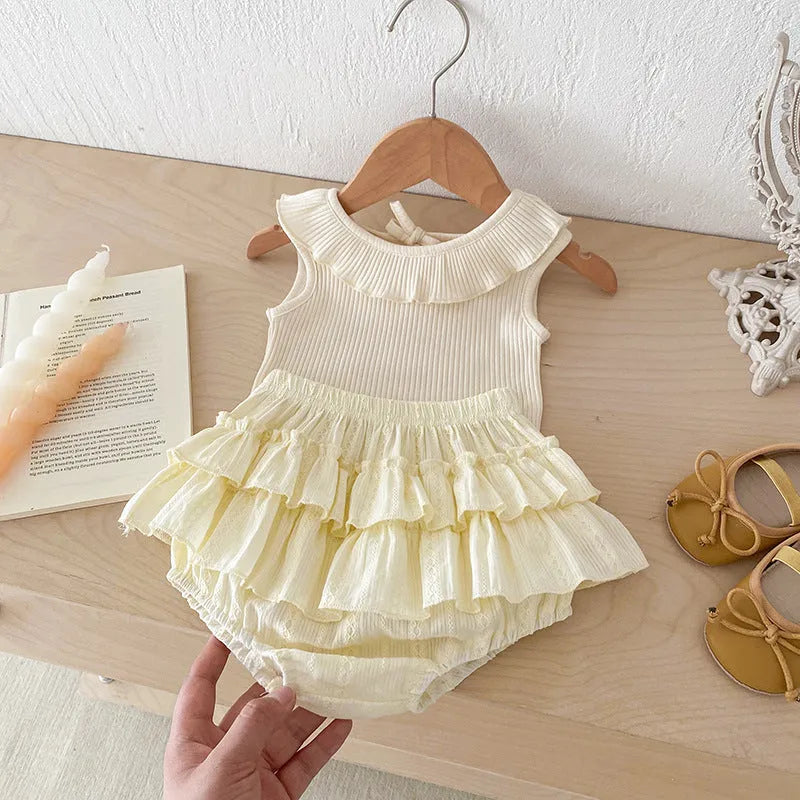 Beige cotton girls summer set with sleeveless ruffled collar top and double-layer bud-waisted shorts