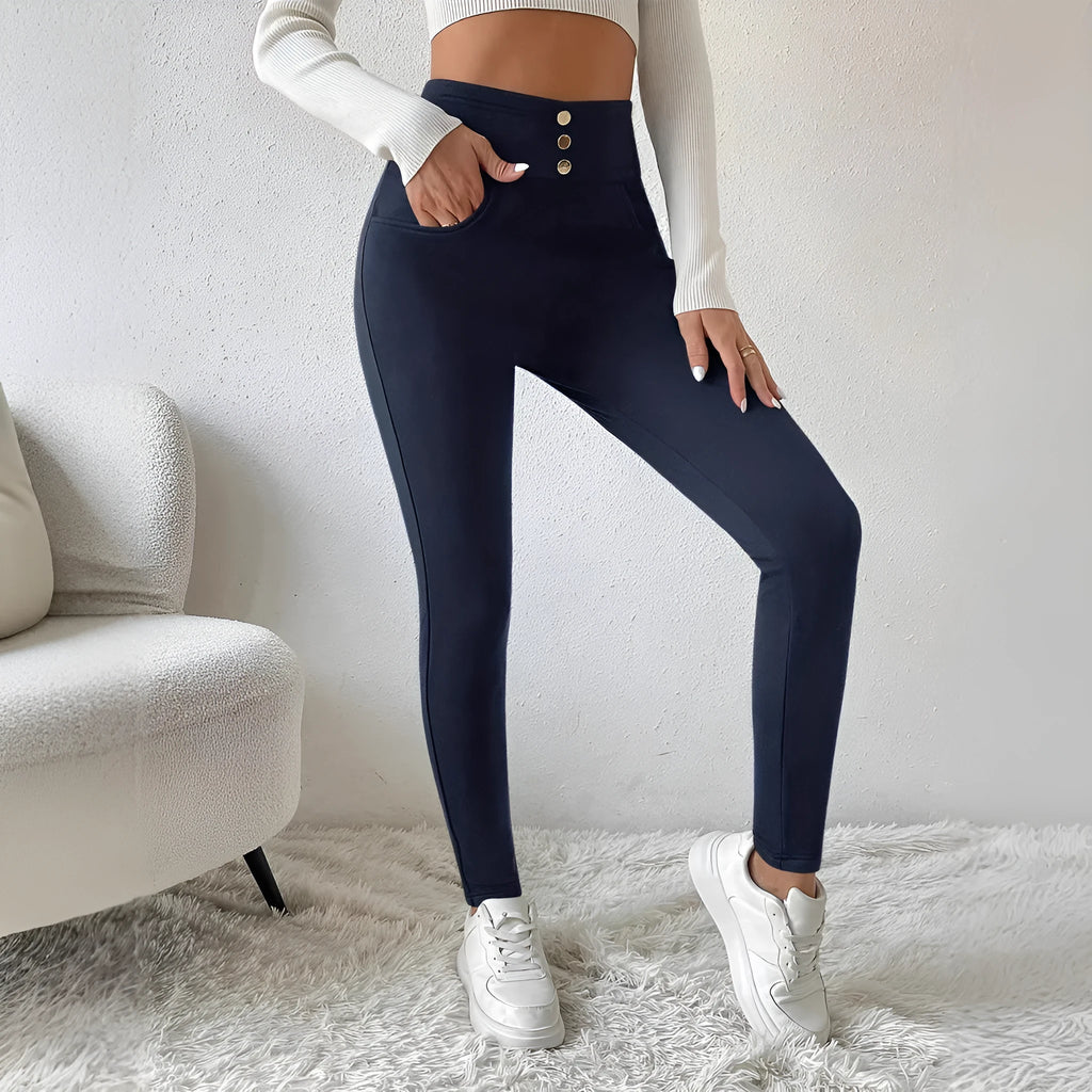 Navy blue women's high-waist trousers with straight-leg design on hanger