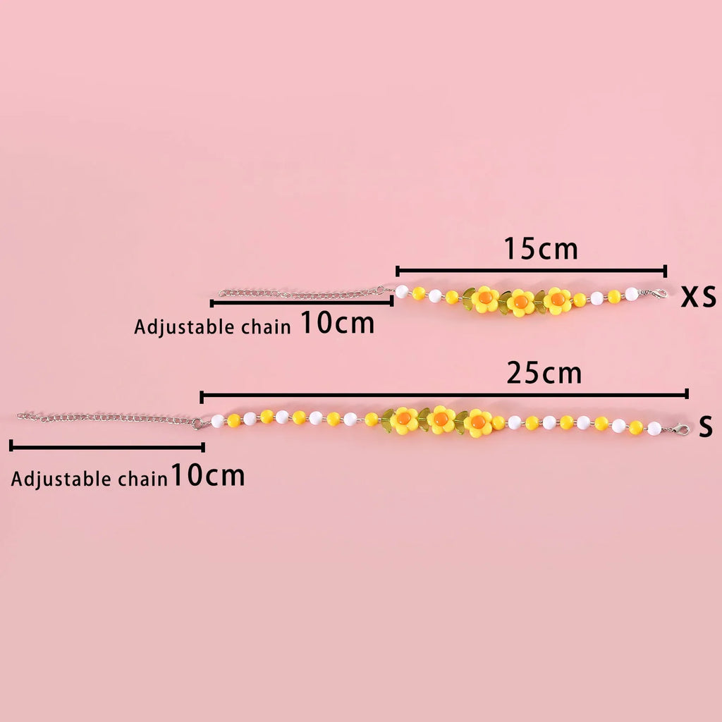 Colourful plastic bead pet necklace for small cats and dogs in peach, rainbow, and small flower designs.