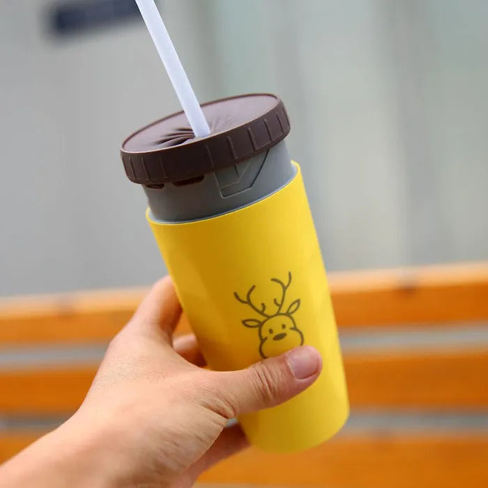 Double-walled insulated travel mug with twist-seal silicone membrane in cartoon design