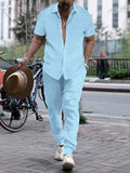Men's loose fit casual beach suit set in cotton blend fabric, showing short sleeve shirt and trousers.
