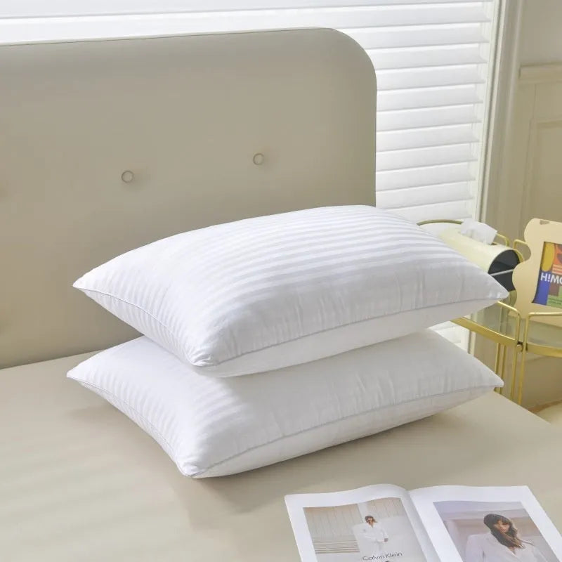 White cotton satin stripe feather pillow showing three size options and loft variations