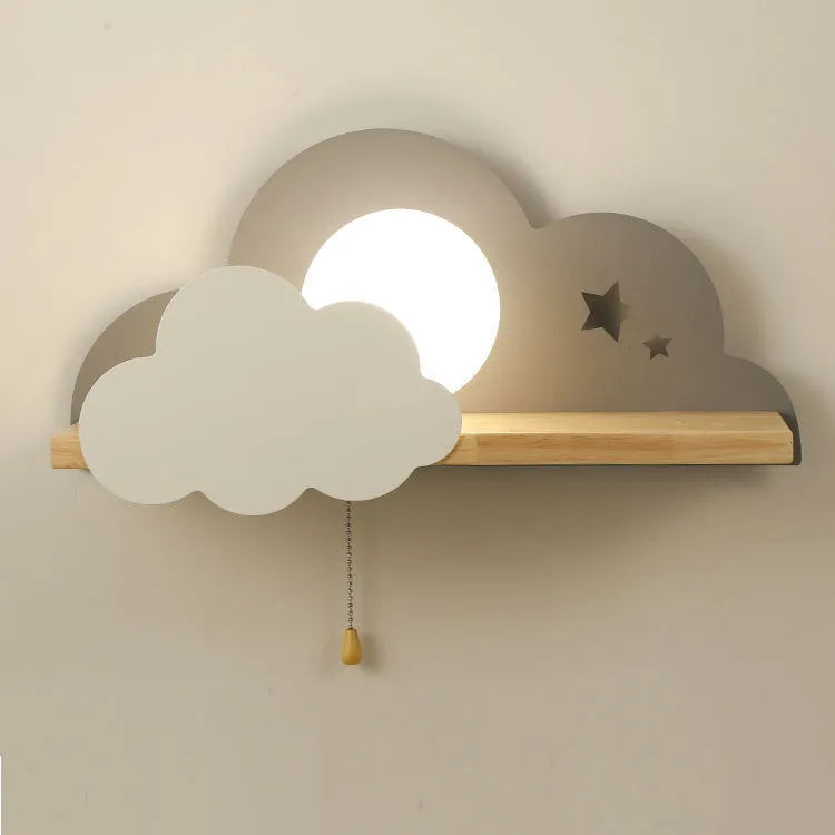 Simple cloud-shaped glass wall lamp mounted on a wall in a grey finish.