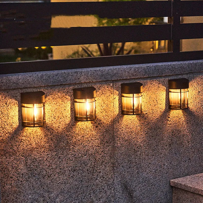 Solar-powered outdoor wall light with IP65 waterproof housing and monocrystalline solar panel