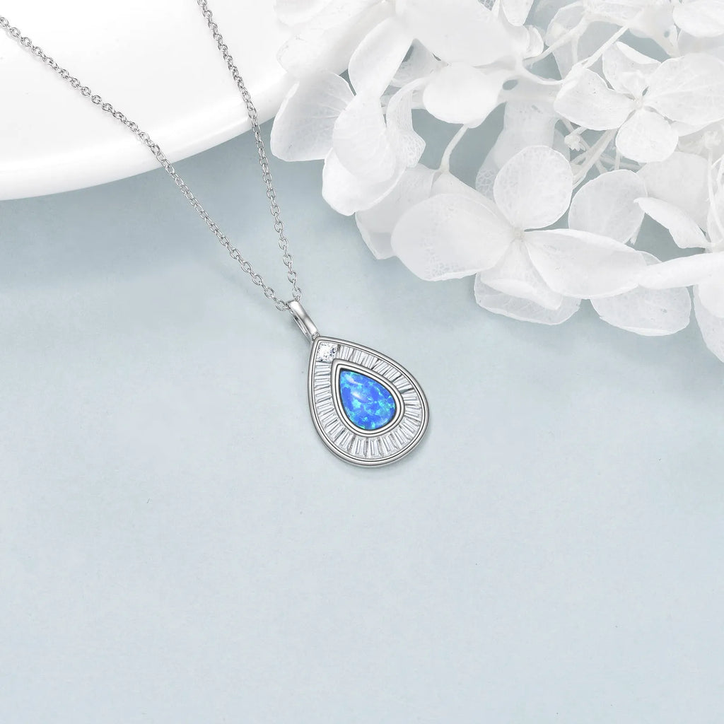 Sterling silver blue opal teardrop necklace with Austrian crystal on white gold plated chain