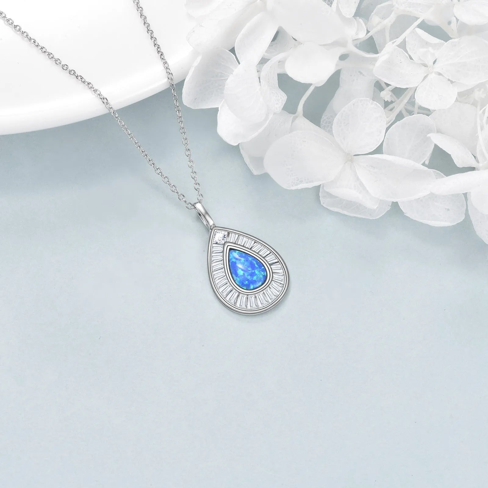 Sterling silver blue opal teardrop necklace with Austrian crystal on white gold plated chain