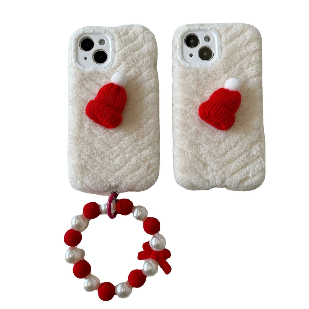 Red silicone phone case with plush Christmas hat bracelet for iPhone on white background