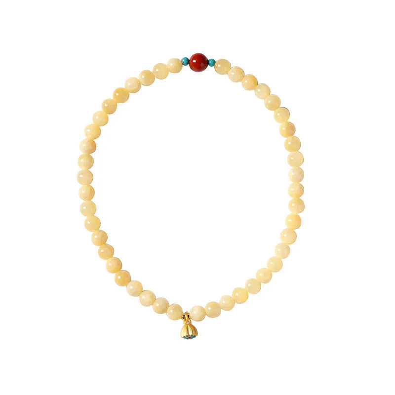 Handmade yellow jade bracelet with double ring design and lotus seedpod shapes