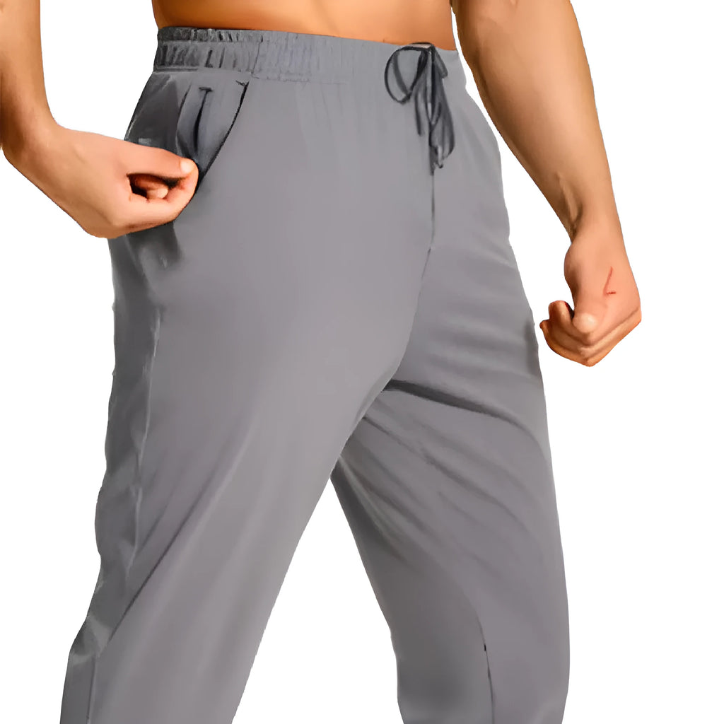 Men's loose fit casual polyester trousers in solid colour available in multiple sizes