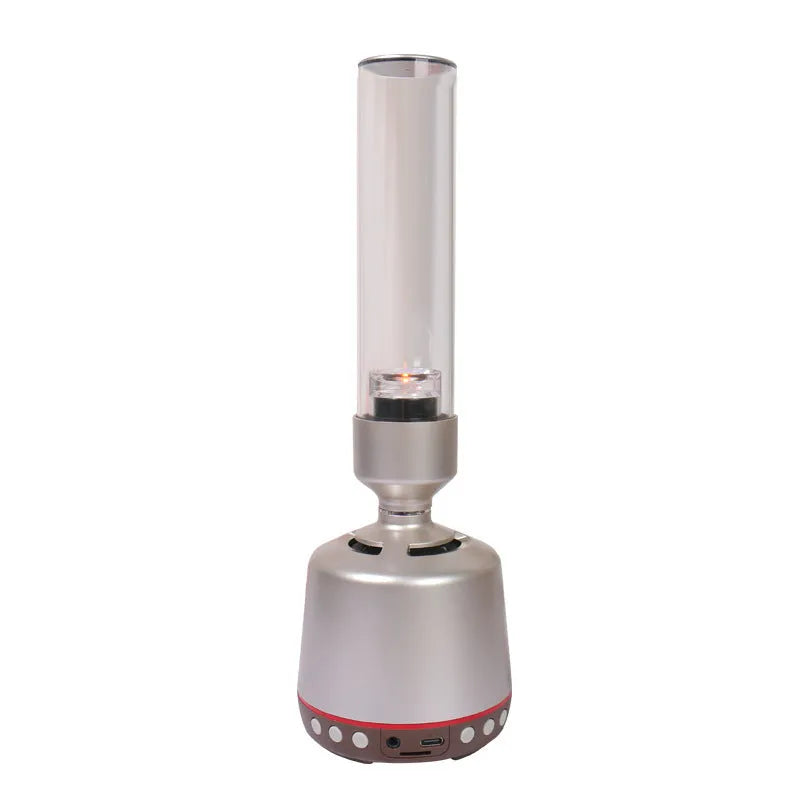 White silver Bluetooth speaker with integrated candlelight atmosphere night light.