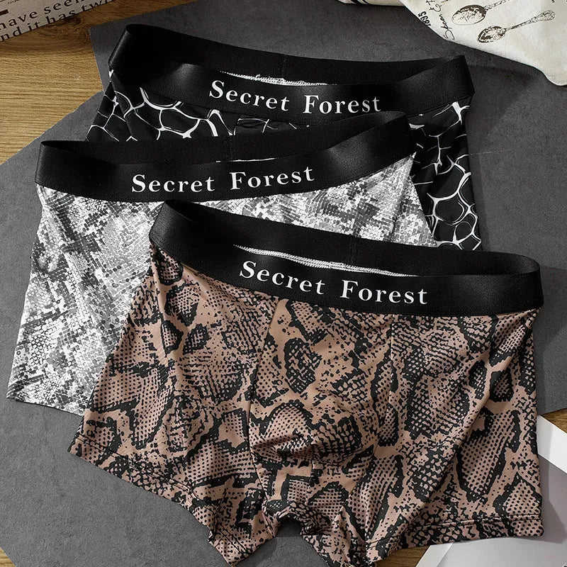 Men's loose fit thin boxer shorts in black, grey, and brown colours, made from quick-dry polyester.