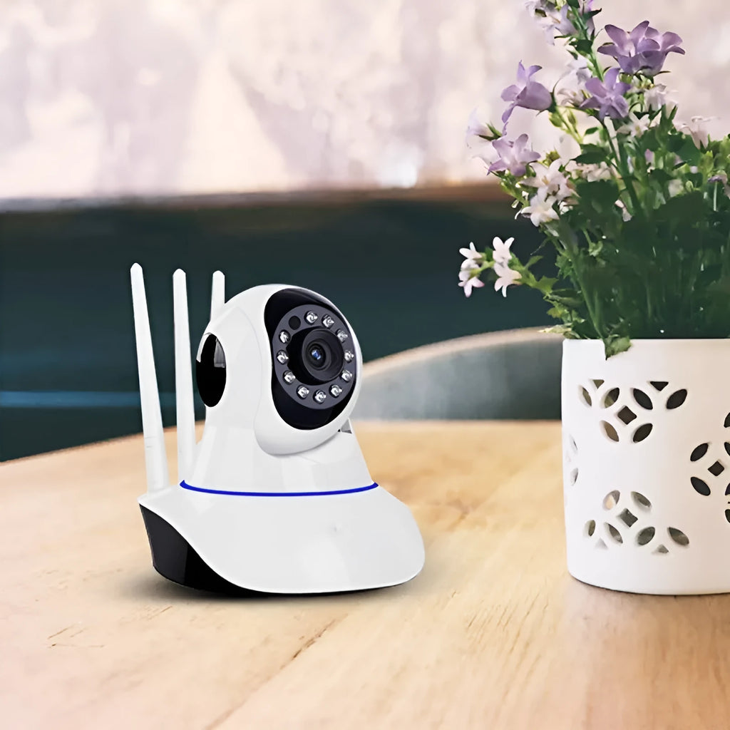 White dome-shaped wireless network security camera with a 3.6mm lens.