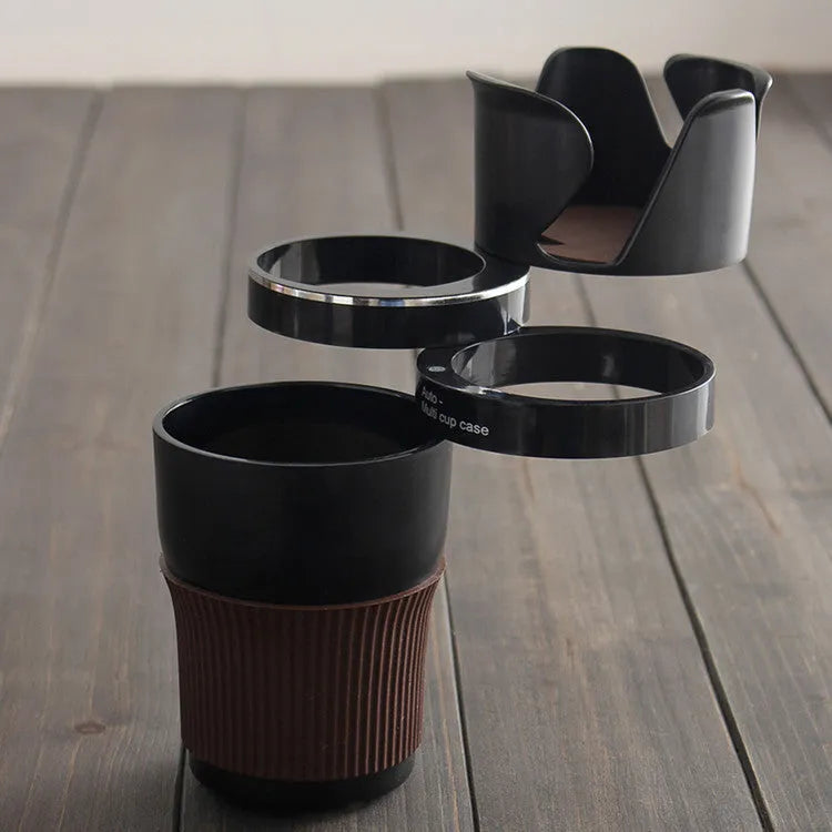 Car multifunctional cup holder and navigation mount organiser in black, brown, pink, green, or blue colours.