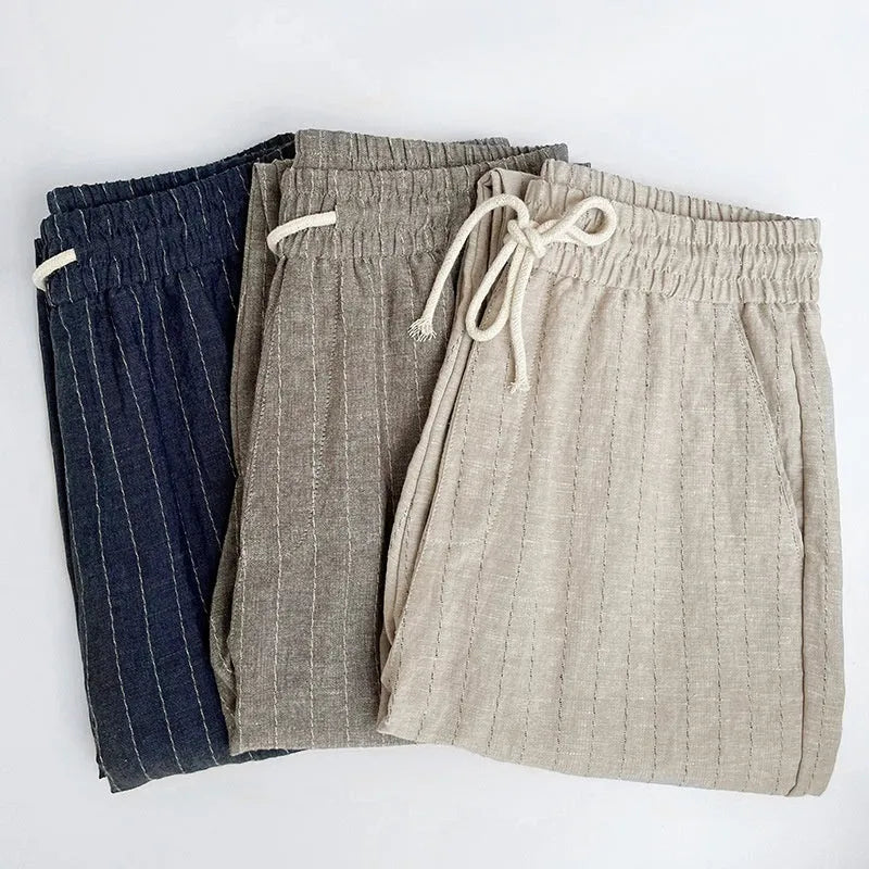 Men's striped cotton linen cropped summer casual pants shown in khaki, coffee, navy and white colour variations